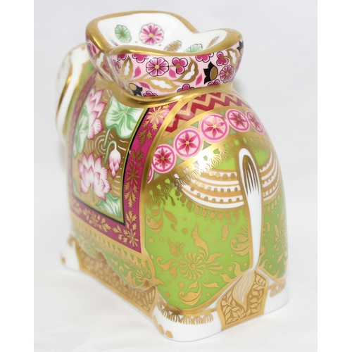 1640 - Royal Crown Derby 'Mother Indian Elephant' with gold, pink and green decoration, approx 11.5cm tall