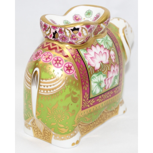 1640 - Royal Crown Derby 'Mother Indian Elephant' with gold, pink and green decoration, approx 11.5cm tall