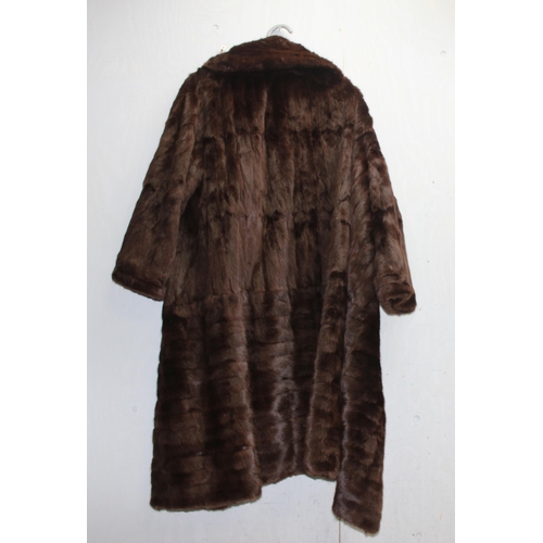 206 - Vintage knee-length brown fur ladies coat from Harrods