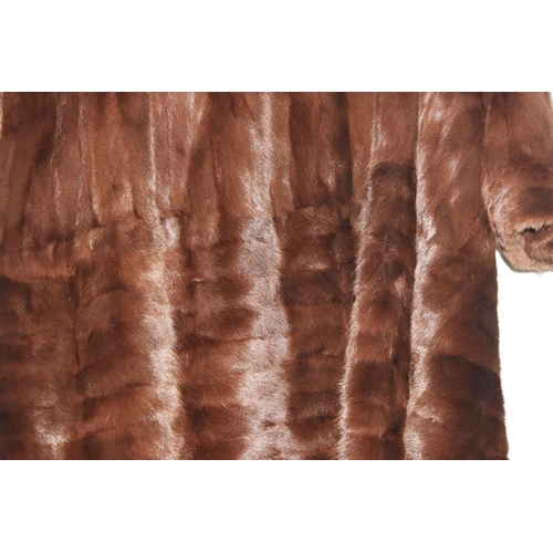 206 - Vintage knee-length brown fur ladies coat from Harrods