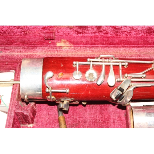 603 - Vintage unbranded Bassoon in case with red interior