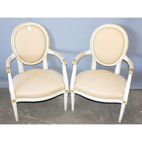 71 - A pair of regency style Fauteuil chairs with shield backs, pattered light upholstery with white pain... 