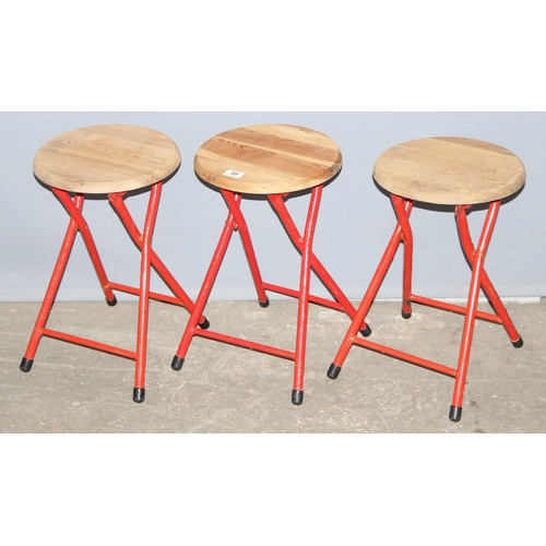 89 - A set of 3 folding pine topped stools with metal bases, each approx 47cm tall