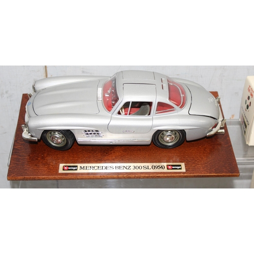 1517 - Qty of toy cars to incl a mounted Mercedes Benz 300 SL (1954), Ferarri Testarossa (1984) in box and ... 