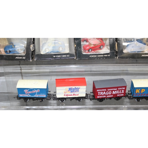 1519 - Qty boxed Monogram Mini Exacts scale vehicles and some advertising haulage containers