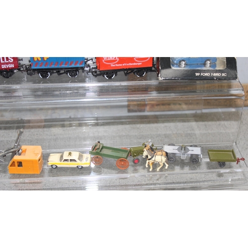 1519 - Qty boxed Monogram Mini Exacts scale vehicles and some advertising haulage containers