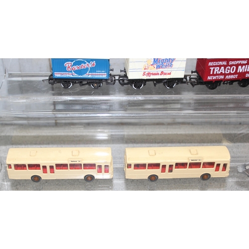 1519 - Qty boxed Monogram Mini Exacts scale vehicles and some advertising haulage containers