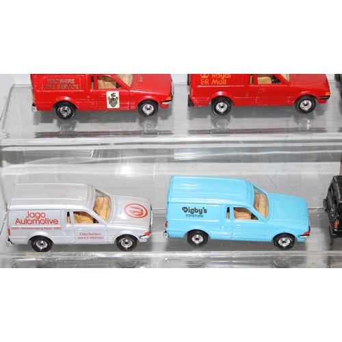 1525 - 13 x diecast Ford Escort vans some with advertising to incl Hotpoint, BT etc