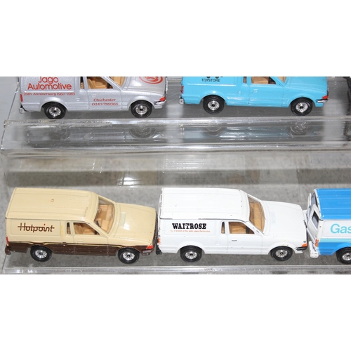 1525 - 13 x diecast Ford Escort vans some with advertising to incl Hotpoint, BT etc