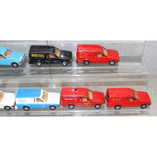 1525 - 13 x diecast Ford Escort vans some with advertising to incl Hotpoint, BT etc