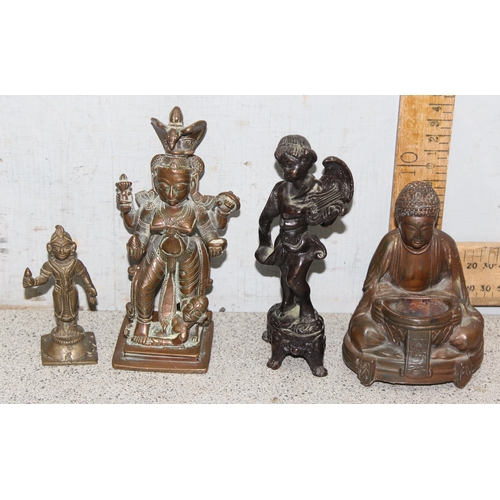 1745 - 4 small antique and later brass/copper statues to include a seated Buddha, largest approx 15cm tall