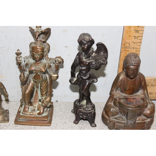 1745 - 4 small antique and later brass/copper statues to include a seated Buddha, largest approx 15cm tall