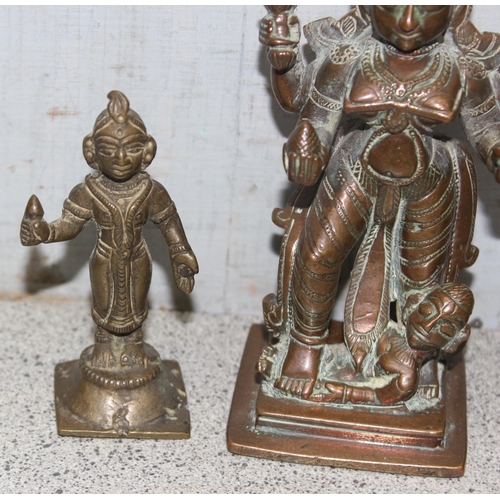 1745 - 4 small antique and later brass/copper statues to include a seated Buddha, largest approx 15cm tall