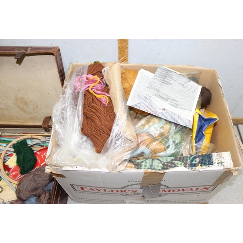 207 - A vintage suitcase of knitting and sewing related items to inc wool, needles, patterns etc, and a fu... 