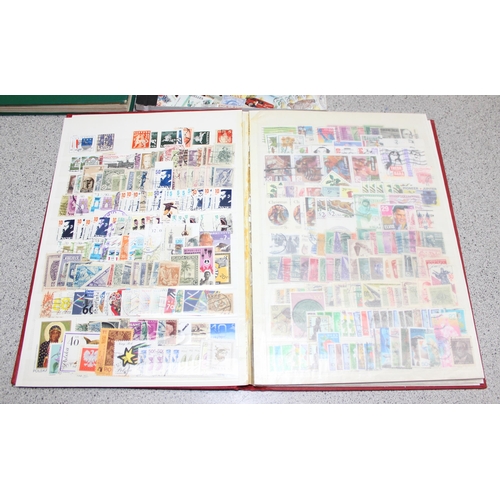 511 - 4 albums of mixed world stamps