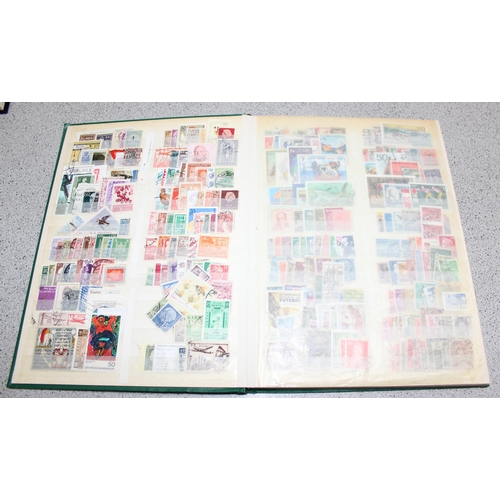 511 - 4 albums of mixed world stamps