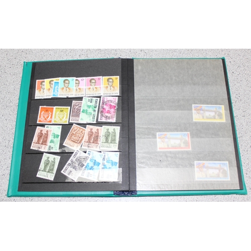 512 - 5 vintage albums of mixed world stamps