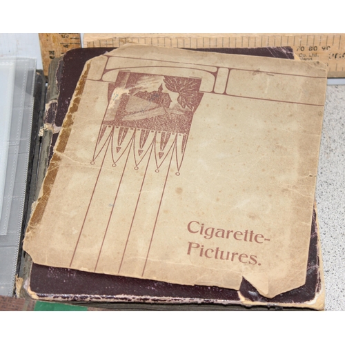 529 - Qty of antique and later cigarette card organisers and albums