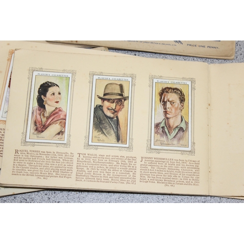 530 - 14 vintage cigarette card albums and contents