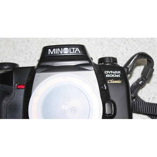 651 - Minolta Dynax 600si camera in aluminium case with 2 lenses and other accessories