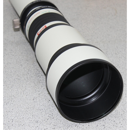 653 - An Opteka 650-1300mm High Definition Telephoto Zoom Lens in case