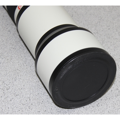 653 - An Opteka 650-1300mm High Definition Telephoto Zoom Lens in case