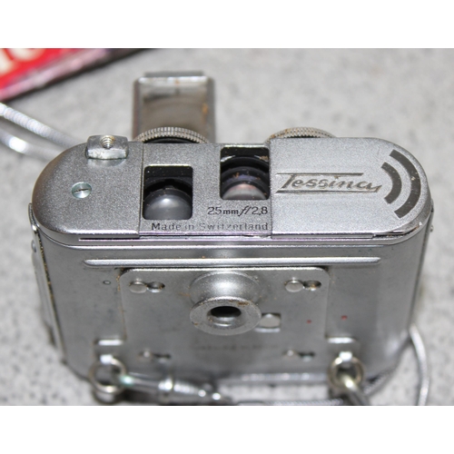 654 - A rare Tessina 35mm Subminiature camera with original strap, case, instructions and a number of film... 