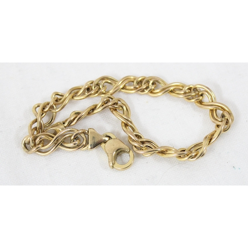 2400 - An unusual Italian 9ct gold bracelet with twisted double links, marked to clasp and XRF confirmed, a... 