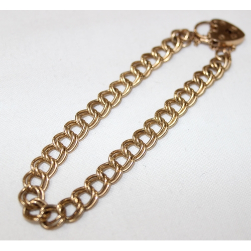 2413 - 9ct gold bracelet with double links and padlock clasp, approx 14.31g gross