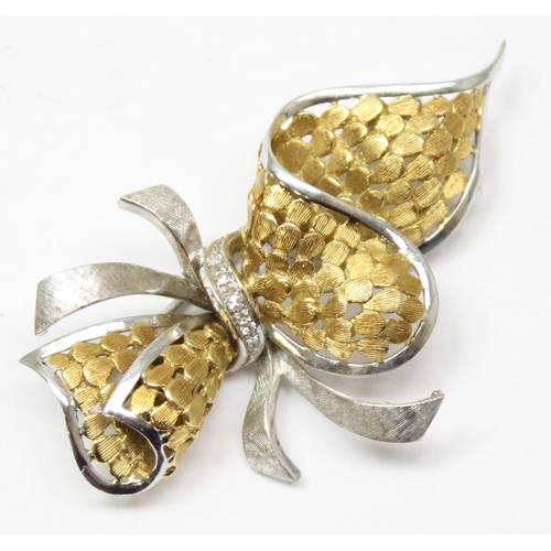 2425 - An Italian 18ct white and yellow gold brooch formed as a ribbon, the centre of the ribbon set with 5... 