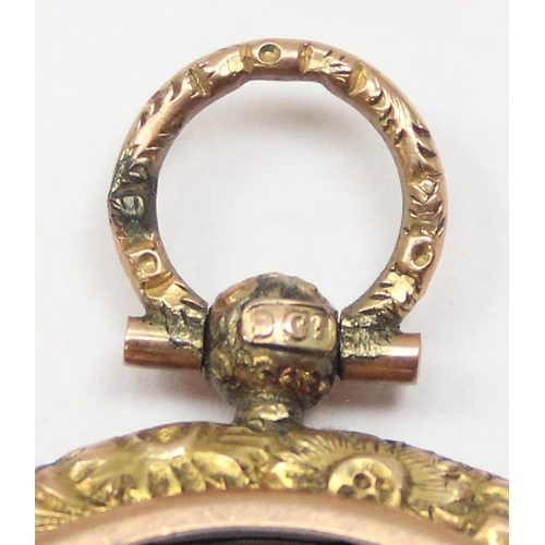 2432 - A Victorian 9ct gold decorative pendant mount, possibly a gold £2 coin mount, marked 9ct and XRF con... 