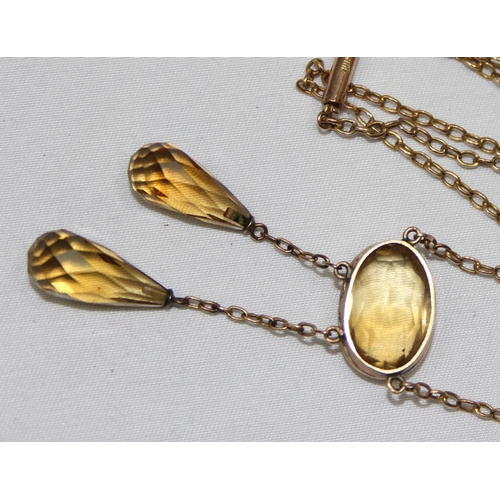 2004 - An Edwardian 9ct gold necklace set with yellow stones and drops, possibly citrines, a central facet ... 