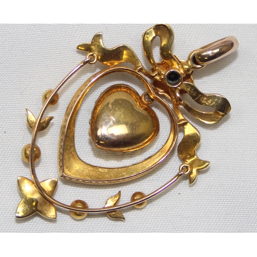 2006 - An antique 14ct gold heart shaped pendant set with diamonds, seed pearls and turquoise, seemingly un... 