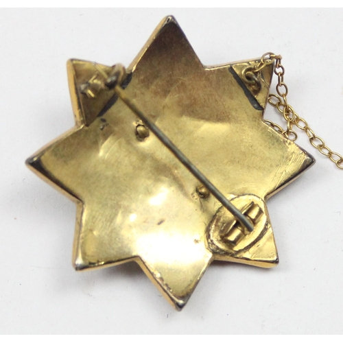 2036 - A 19th century garnet mounted star brooch, mounted in gold plated metal, approx 35mm wide