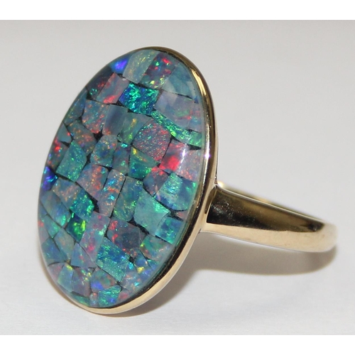 2051 - A retro style 9ct gold cocktail ring set with a patchwork blue stone, possibly a black opal triplet,... 