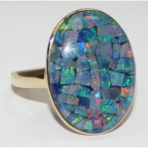 2051 - A retro style 9ct gold cocktail ring set with a patchwork blue stone, possibly a black opal triplet,... 