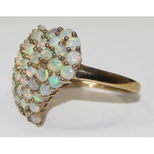 2052 - A 9ct gold opal cluster ring formed as a stylised heart, full English hallmarks, approx size U, appr... 