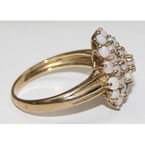 2053 - A 9ct gold opal floral cluster ring, full English hallmarks, approx size T, approx 4.01g gross