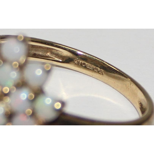 2053 - A 9ct gold opal floral cluster ring, full English hallmarks, approx size T, approx 4.01g gross