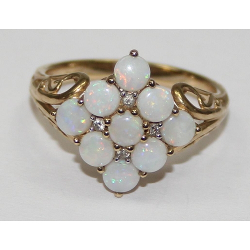 2054 - A 9ct gold opal cluster ring, full English hallmarks, approx size U, approx 3.97g gross