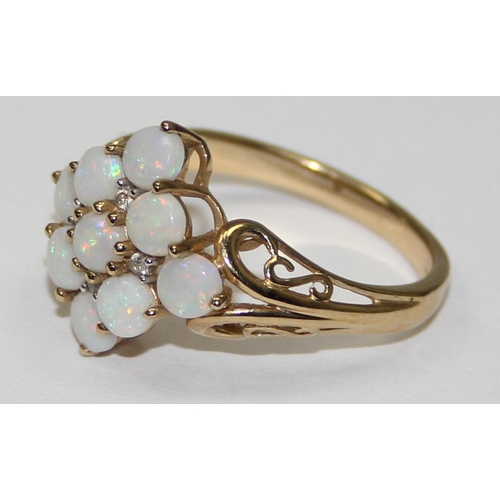 2054 - A 9ct gold opal cluster ring, full English hallmarks, approx size U, approx 3.97g gross