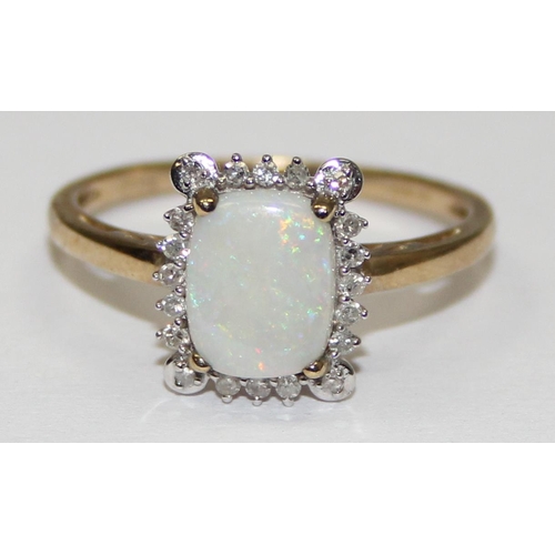 2060 - A 9ct gold cushion shaped opal and small diamond ring, full English hallmarks, approx size T, approx... 