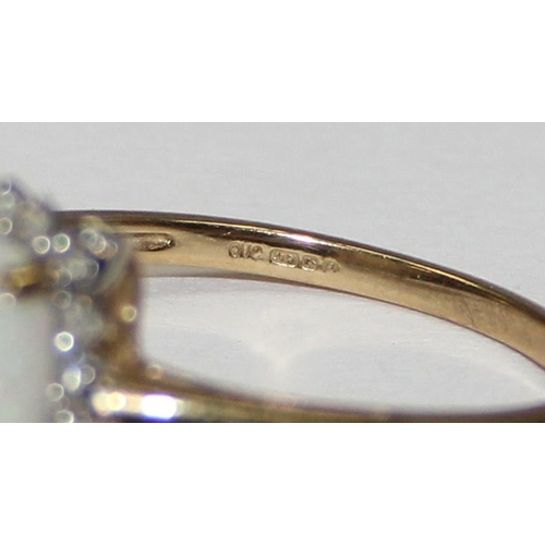 2060 - A 9ct gold cushion shaped opal and small diamond ring, full English hallmarks, approx size T, approx... 