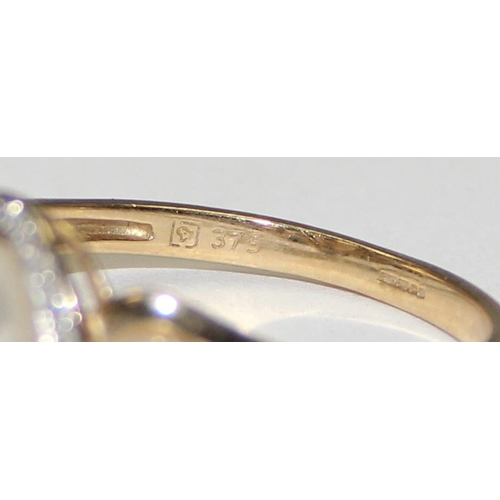 2066 - A 9ct gold trilogy pearl and small diamond ring, full English hallmarks, approx size U, approx 3.09g... 