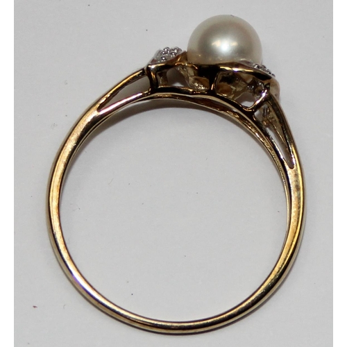 2067 - A 9ct gold solitaire pearl and small diamond ring, full English hallmarks, approx size U, approx 2.1... 