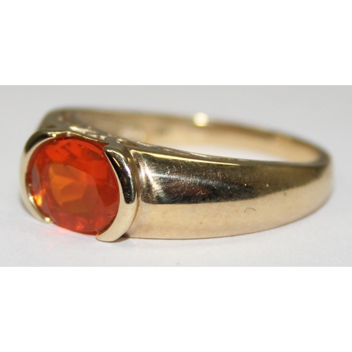 2079 - A retro style 9ct gold orange stone dress ring, full English hallmarks, approx size T, approx 4.49g ... 