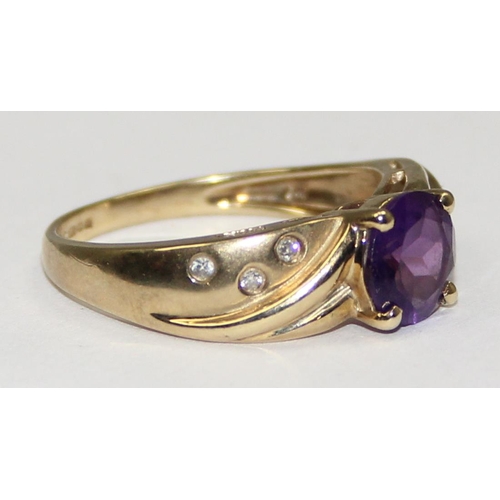 2094 - A 9ct gold amethyst and diamond ring, full English hallmarks, approx size U, approx 3.51g gross