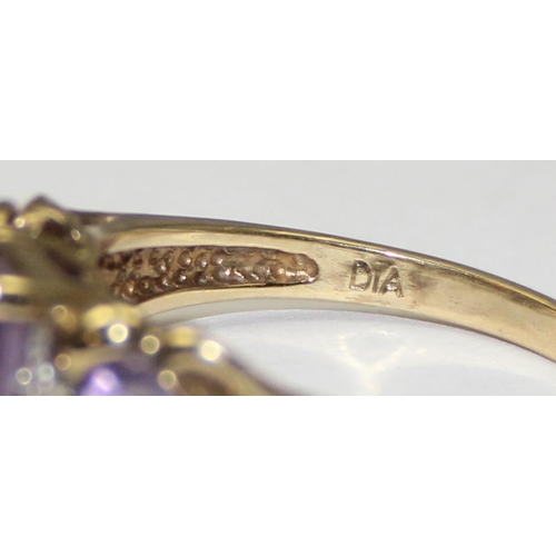 2101 - An antique style 9ct gold trilogy amethyst and diamond ring, full English hallmarks, approx size U, ... 