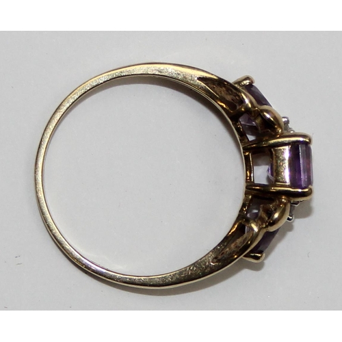 2101 - An antique style 9ct gold trilogy amethyst and diamond ring, full English hallmarks, approx size U, ... 