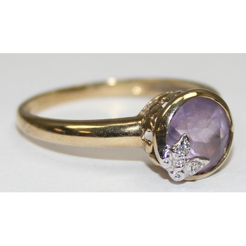 2105 - A retro style 9ct gold light purple stone and diamond ring, full English hallmarks, approx size T, a... 